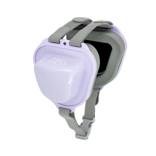 A purple pet earmuff with grey lining and adjustable Velcro straps, designed for secure and comfortable fit, provide noise reduction